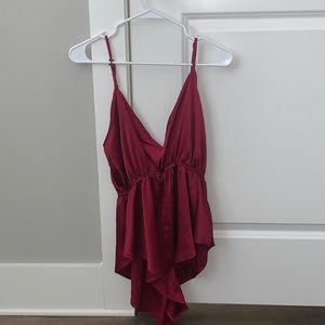 Deep plunge shorts romper in red